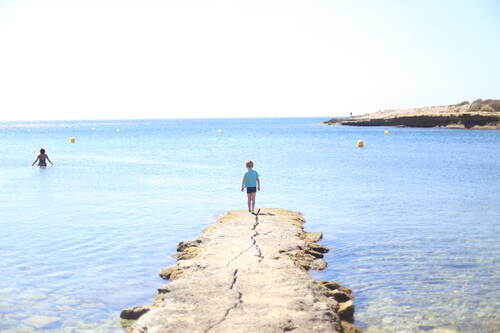 A kid at the beach