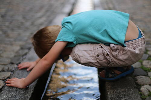 A kid over water