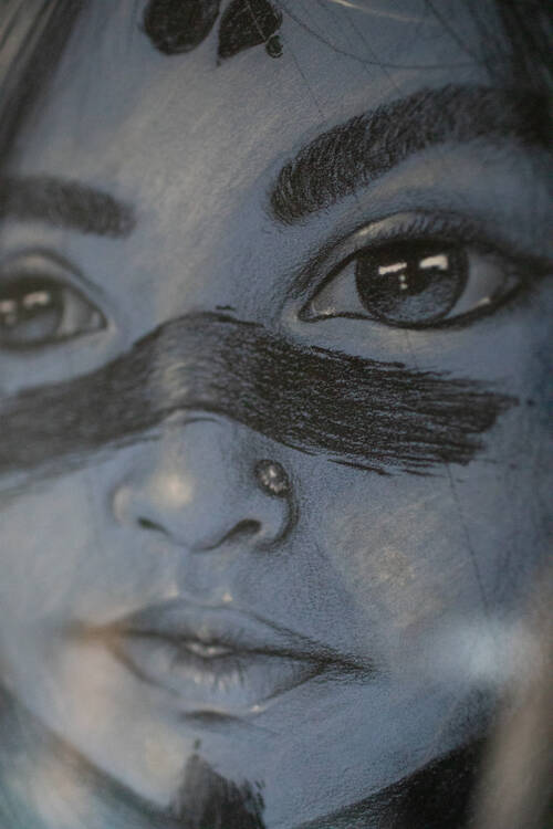Pencil drawing of a girl with war marks on her face