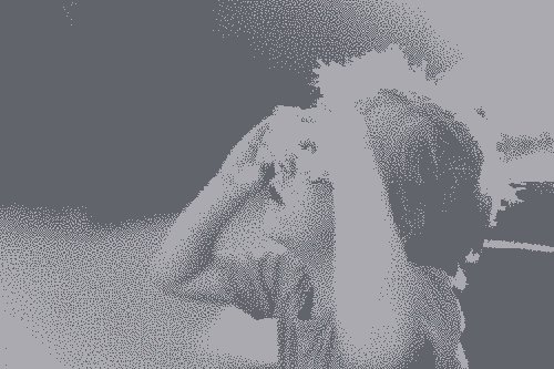 Un kid looking through glass