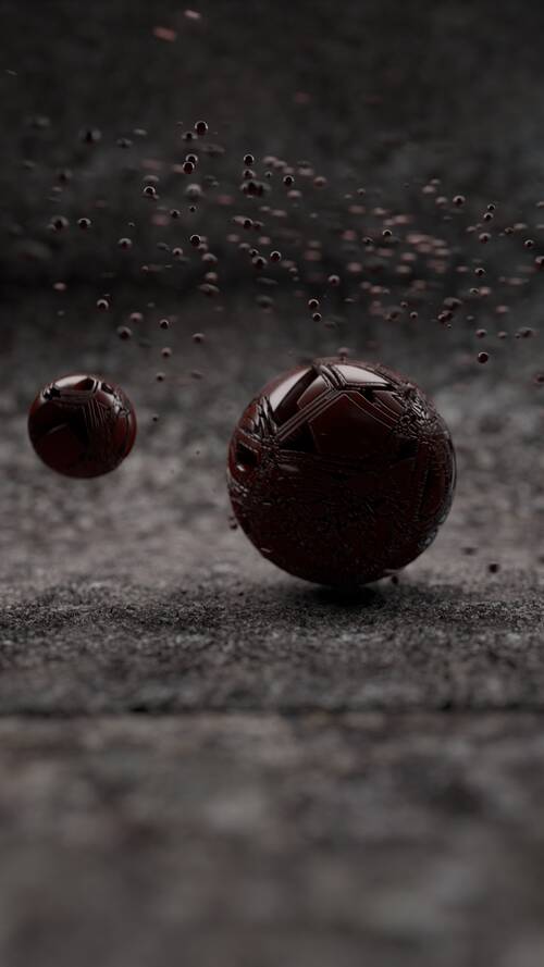 3D rendered image representing a strange red sphere and some little one which gravitate around the big one.